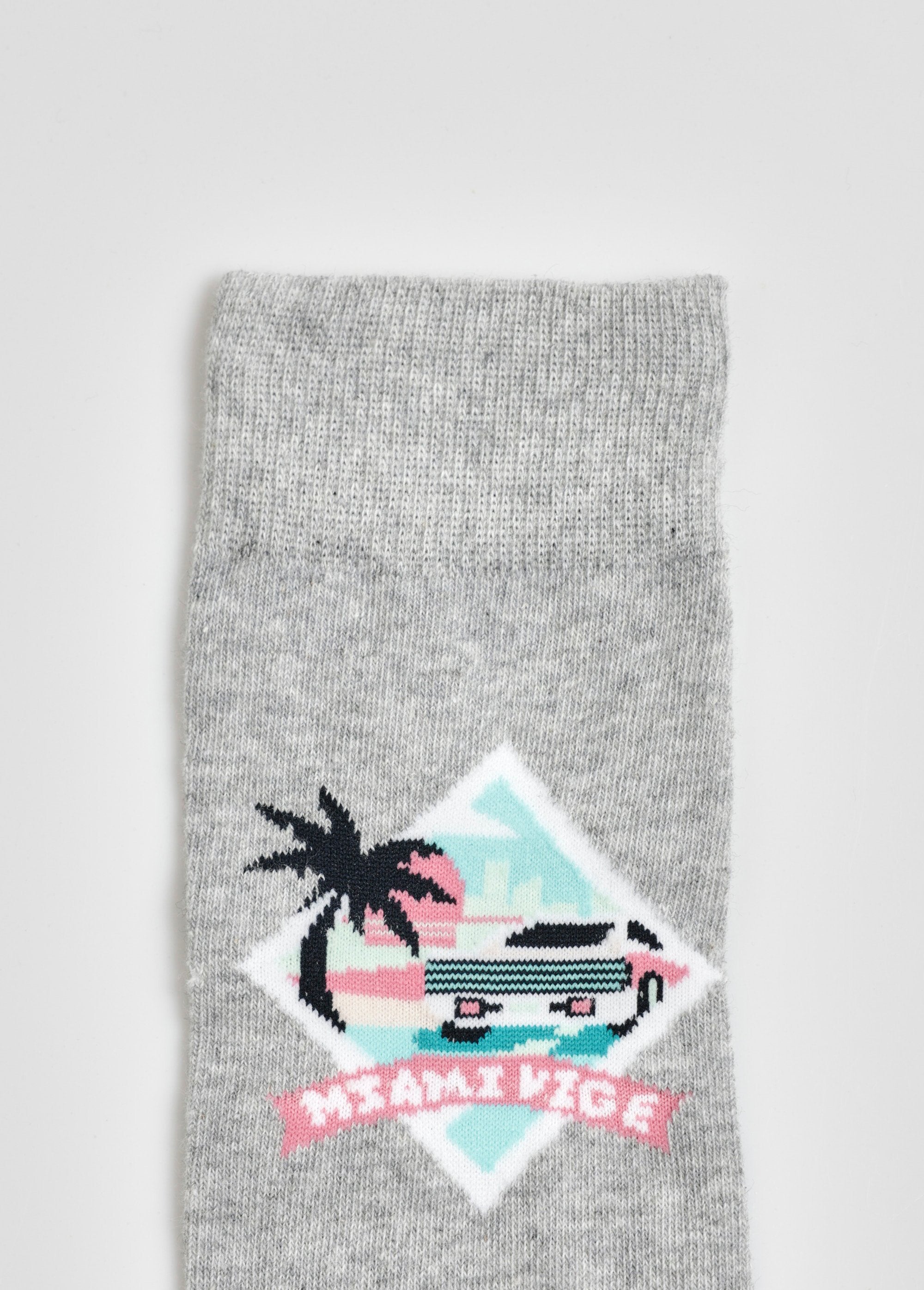 Pair_of_Miami_Vice_licensed_socks_Gray_and_turquoise_DE2_slim