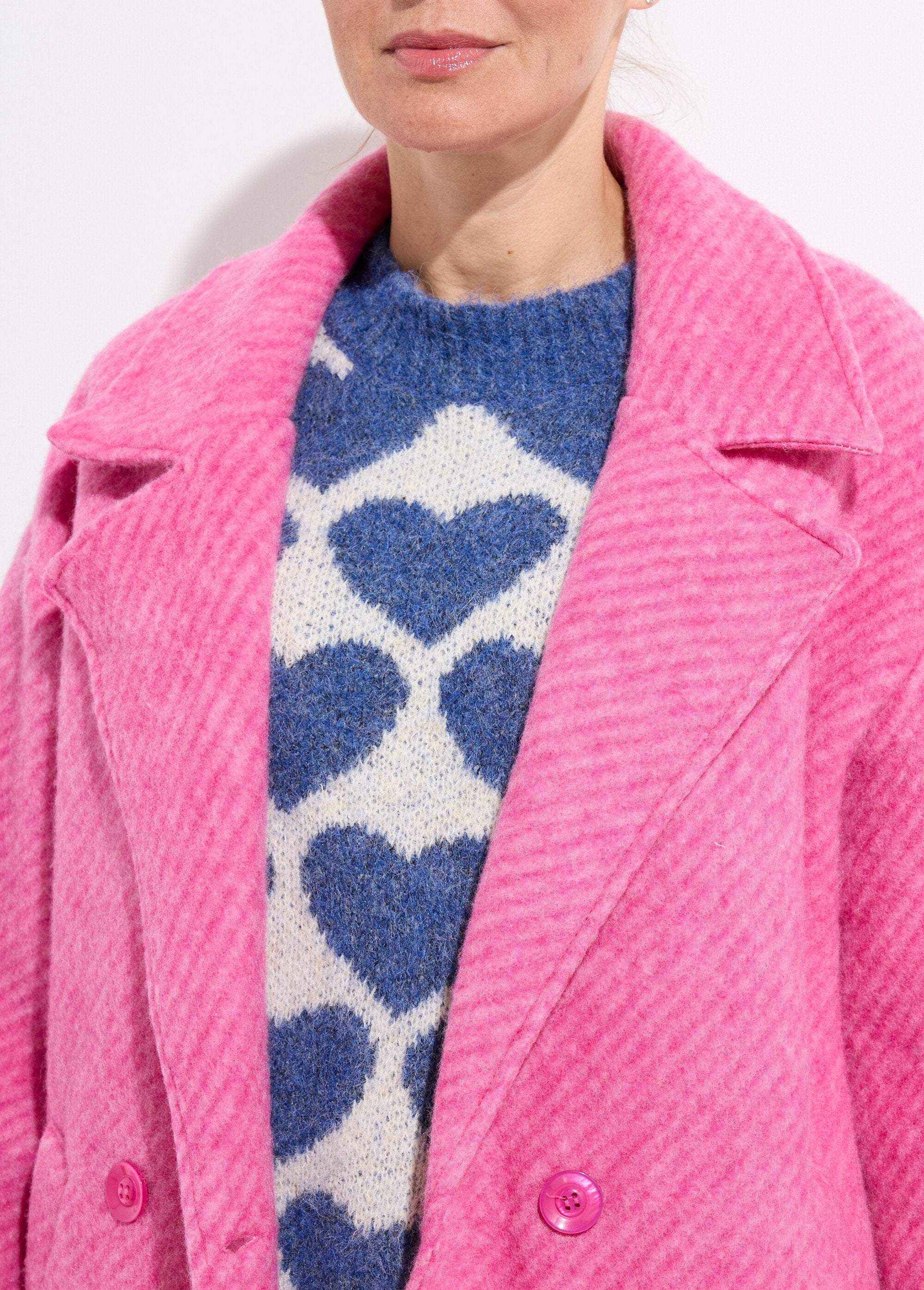 Long_coat_in_warm_wool_with_a_ribbed_pattern_Fuchsia_DE1_slim