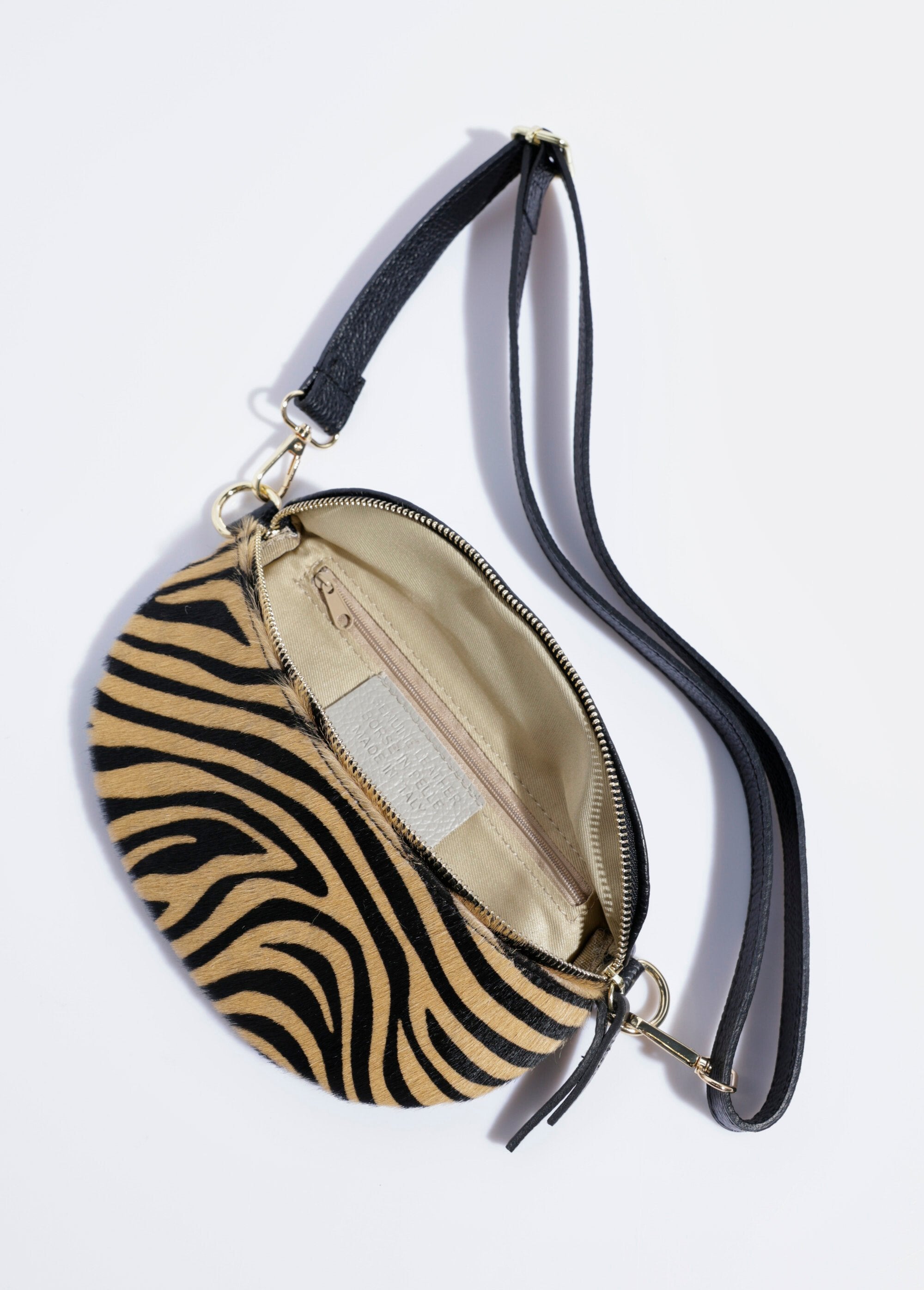 Two-material_belt_bag_in_plain_and_zebra-print_leather_camel_DE1_slim
